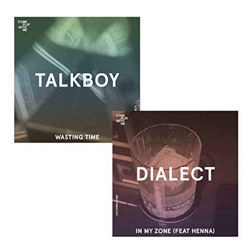 "Two vinyl record covers, one with a pen and paper, the other with a glass."
