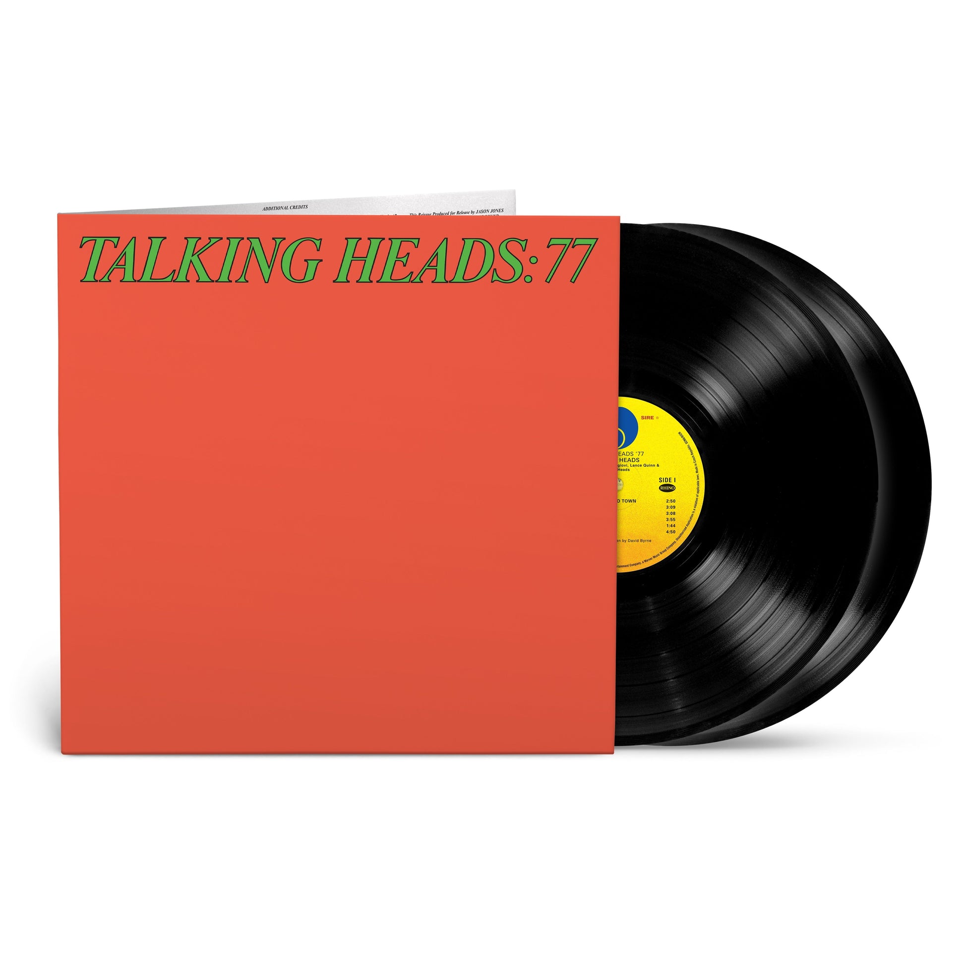 Talking Heads “77” vinyl record with red cover and black disc.