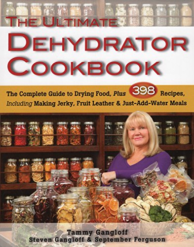 Cookbook cover with woman, jars of dried food, and title “The Ultimate Dehydrator Cookbook.”