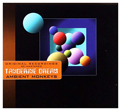 Colorful spheres on a black background with a blue square and orange label.