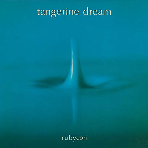 Teal album cover with a central splash and text tangerine dream rubycon.