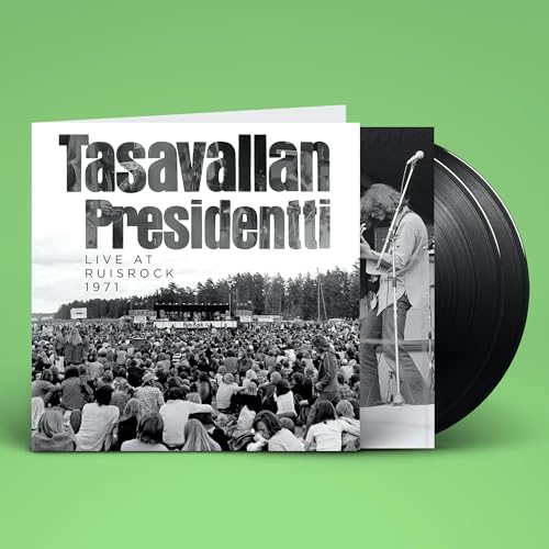 Black vinyl record with album cover featuring a musician and crowd.
