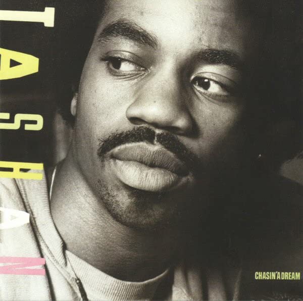 CD cover featuring a close-up portrait of Tashan, a Black male artist.
