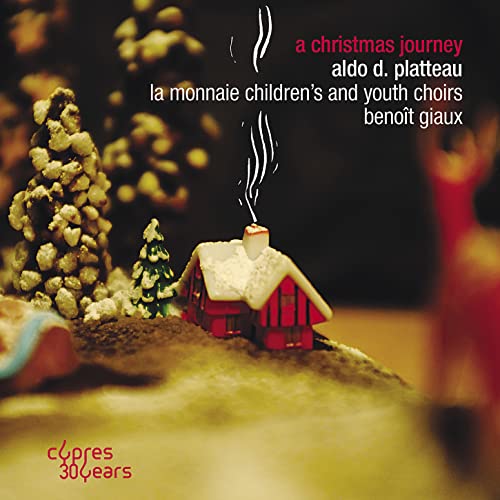 CD cover with miniature winter village scene and red text.