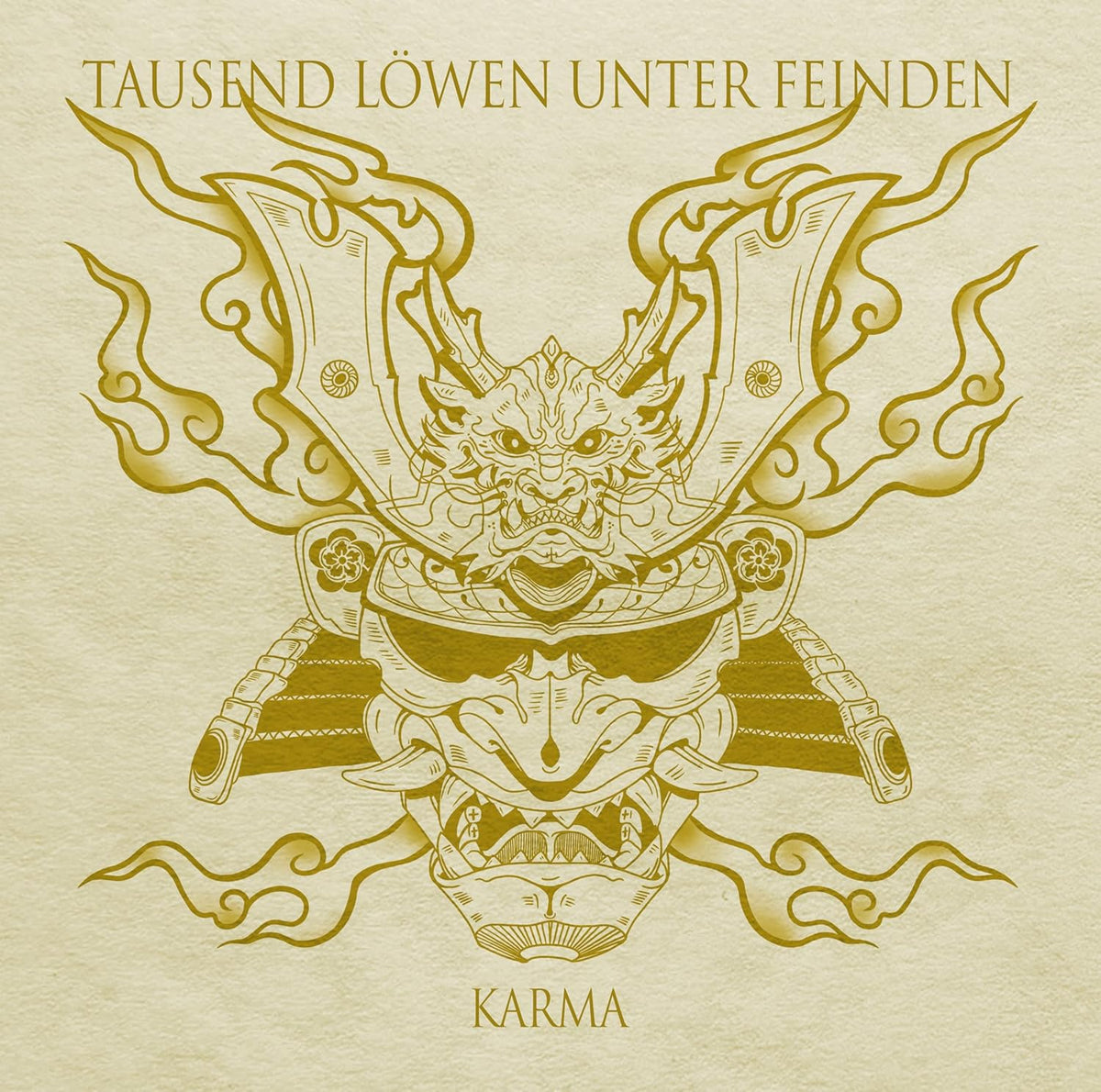 Golden illustration of a fierce, armored face with ornate wings.