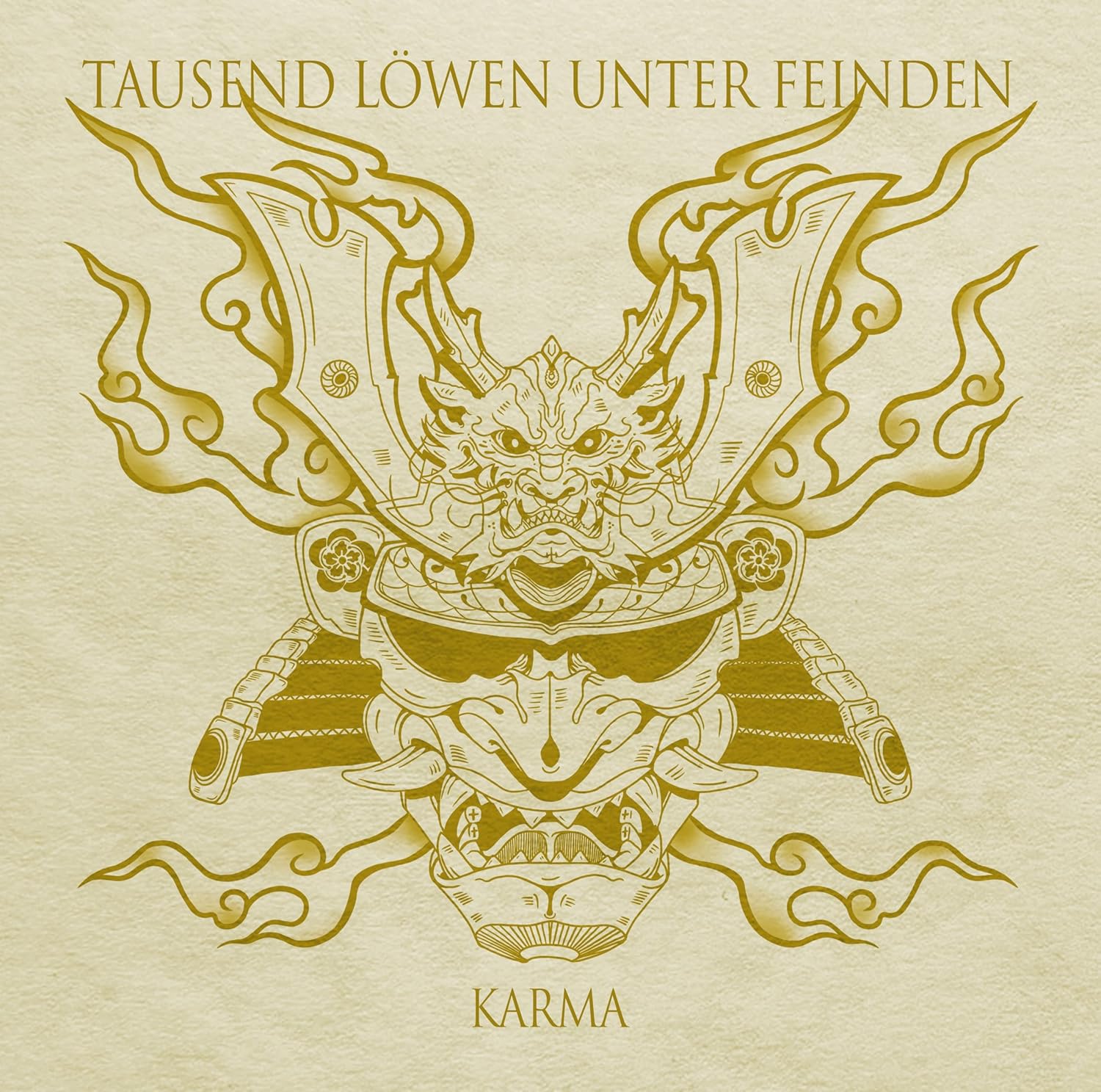 Golden illustration of a fierce, armored face with ornate wings.