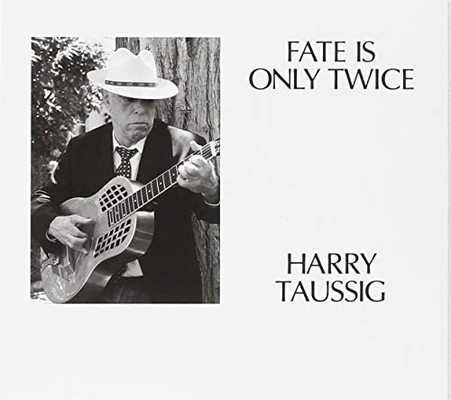 "Album cover with black and white photo of man playing resonator guitar."