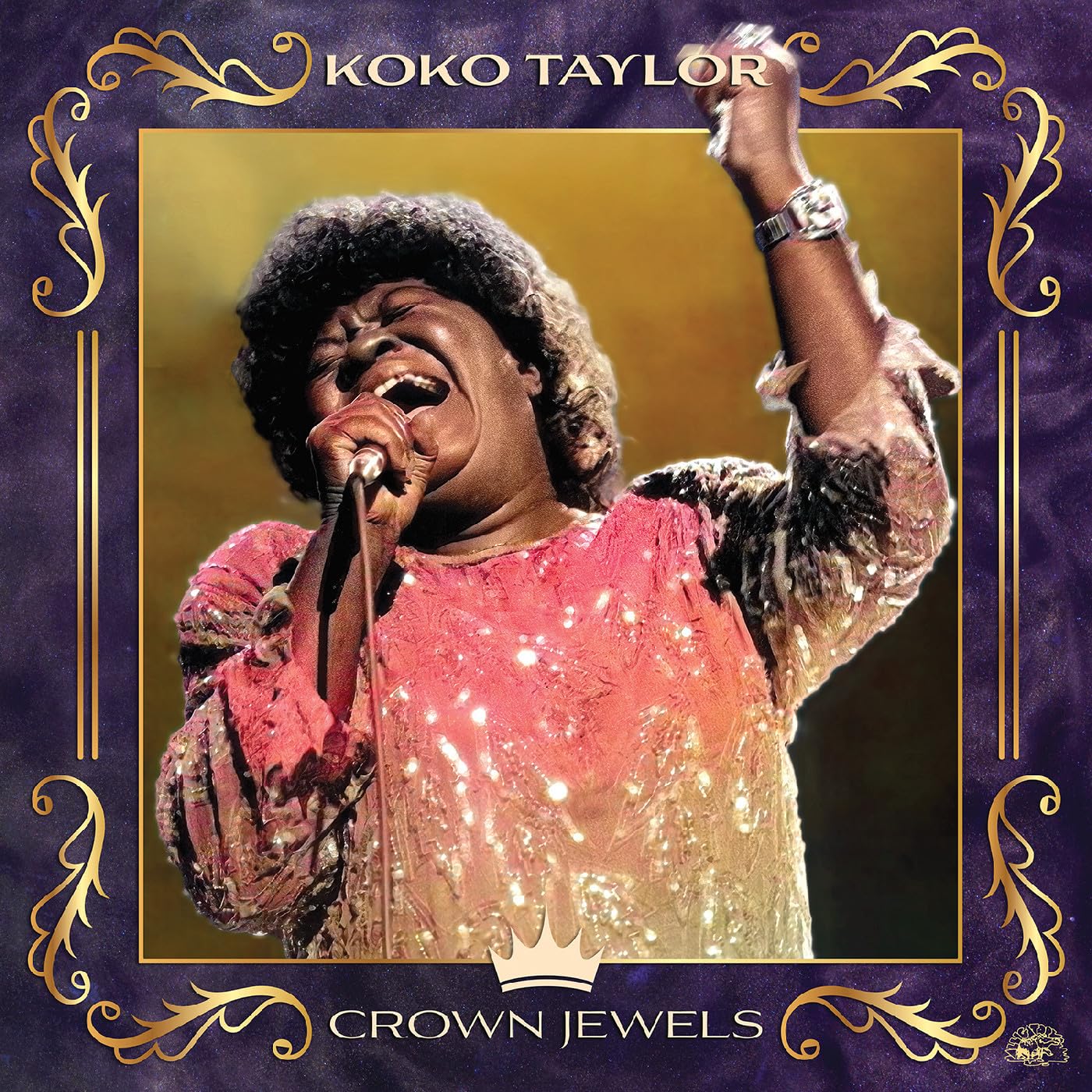 Koko Taylor singing into a microphone, album cover for "Crown Jewels".