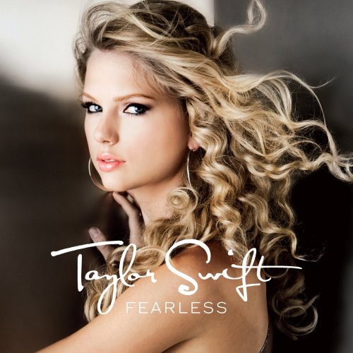 Taylor Swift’s “Fearless” album cover featuring her with curly blonde hair.