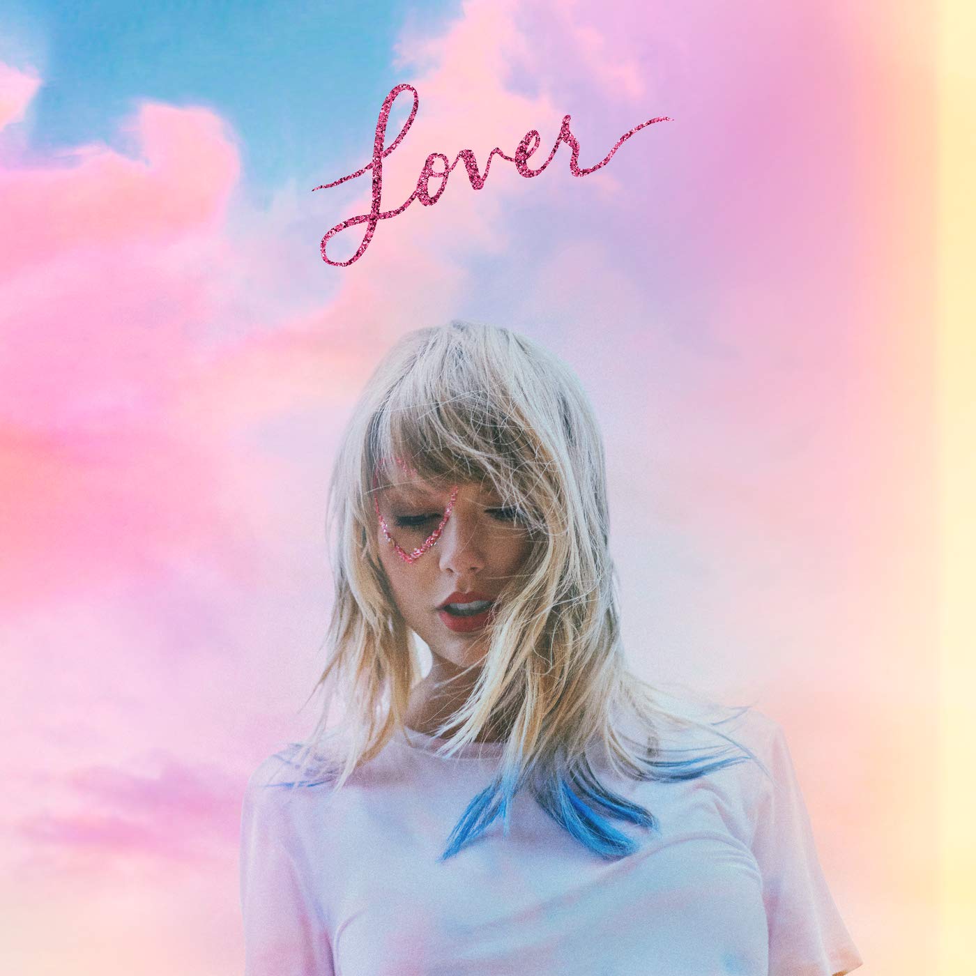 Taylor Swift album cover with pastel sky background and "Lover" title in pink script.