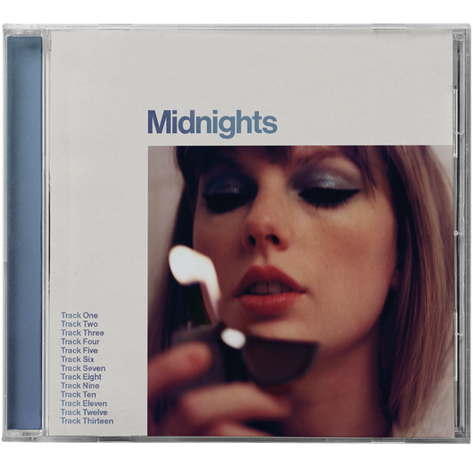 Taylor Swift’s “Midnights” CD case with a portrait and tracklist.