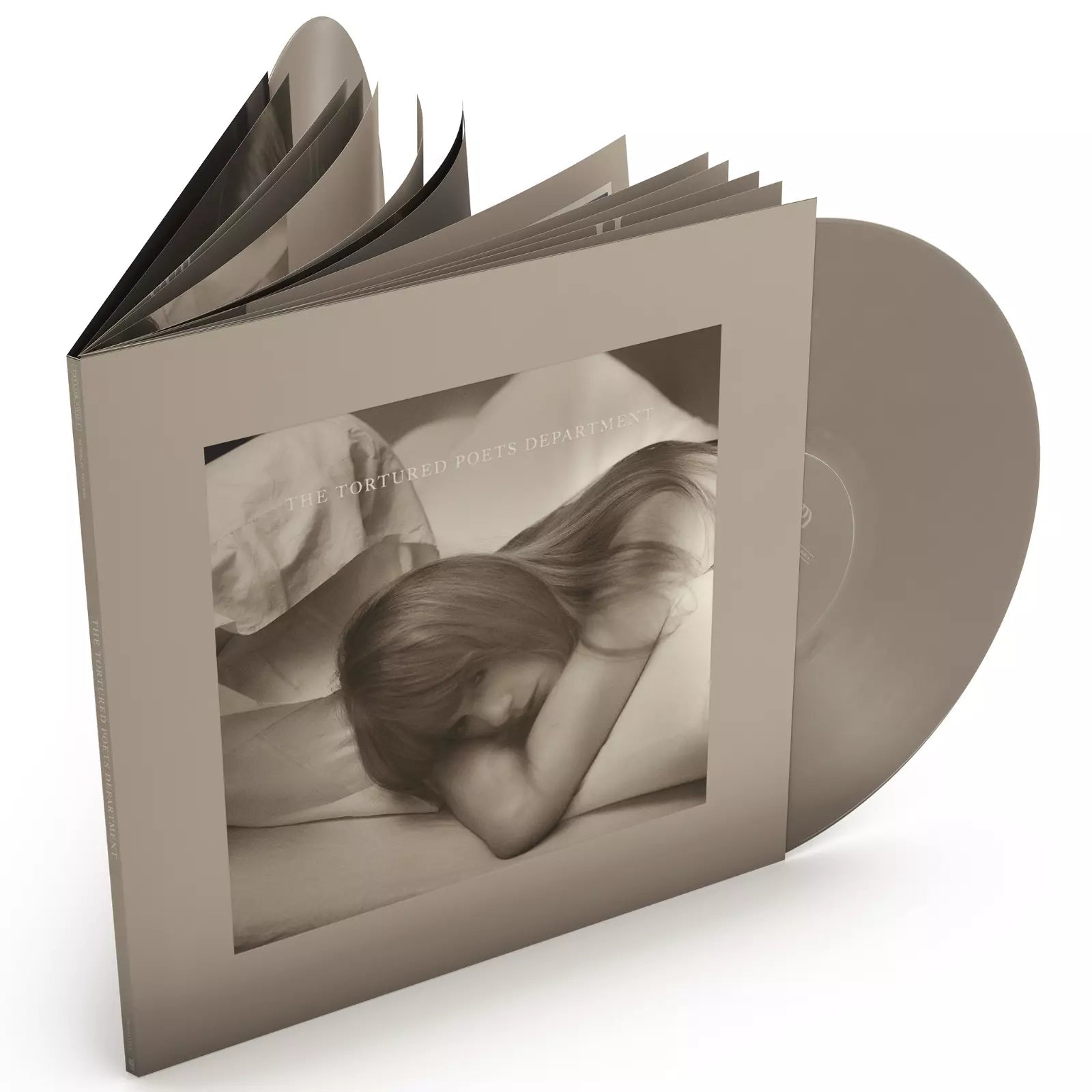 The Tortured Poets Department vinyl record set with open gatefold sleeve and beige disc.