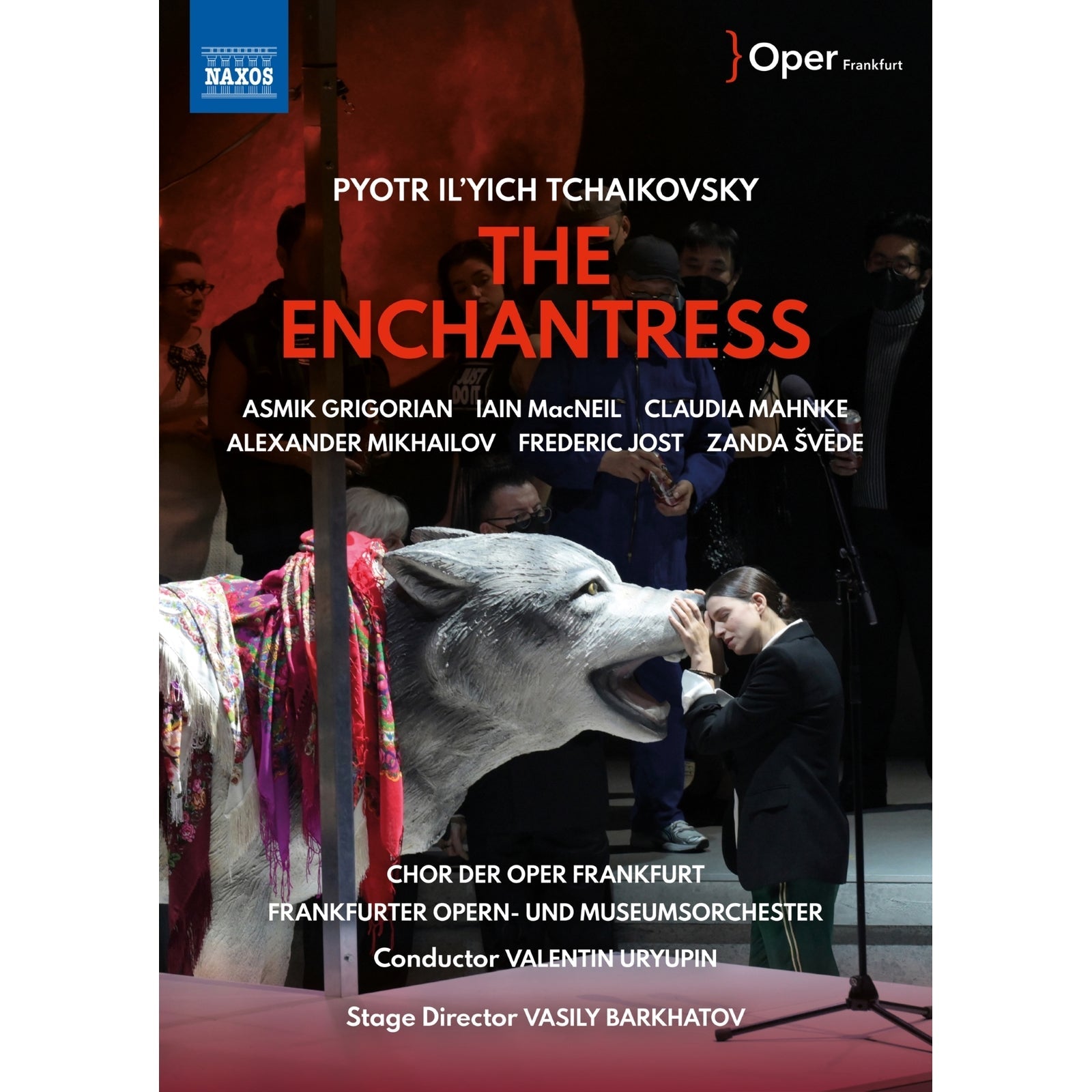 DVD cover for Tchaikovsky’s “The Enchantress” opera featuring performers and a wolf.