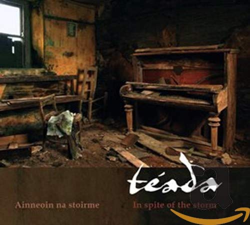 Damaged piano in a dilapidated room, album cover for Teada’s “In Spite Of The Storm.”