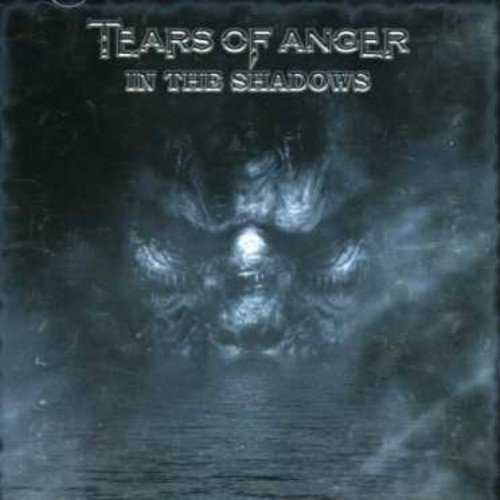 CD cover for “Tears Of Anger - In the Shadows” with a shadowy face.