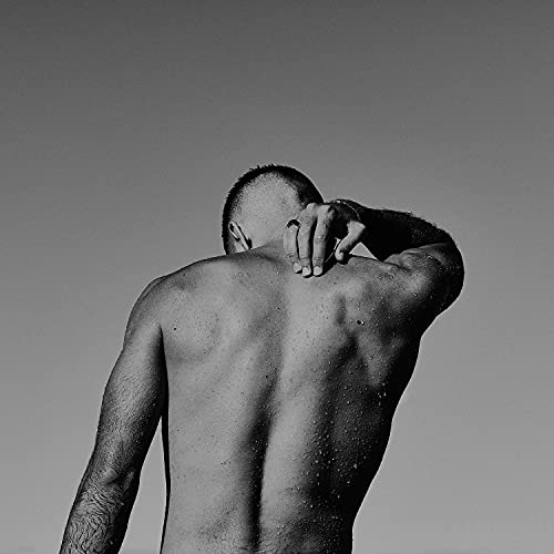 Black and white album cover featuring a man’s bare back and neck.