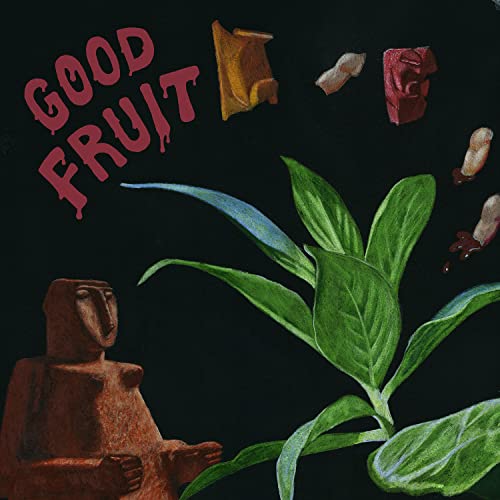 Album cover: statue, plant, fruit pieces, and red text on black background.