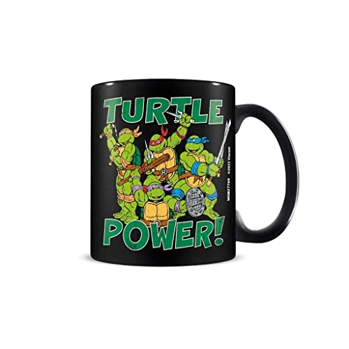 Black ceramic mug with Teenage Mutant Ninja Turtles illustration.