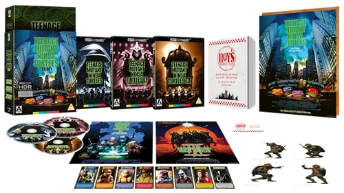 Teenage Mutant Ninja Turtles" Blu-ray trilogy box set with films, discs, and collectibles.