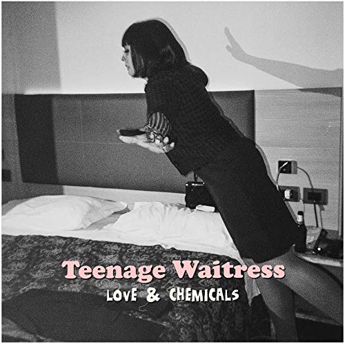 Black and white album cover featuring a woman in a bedroom scene.