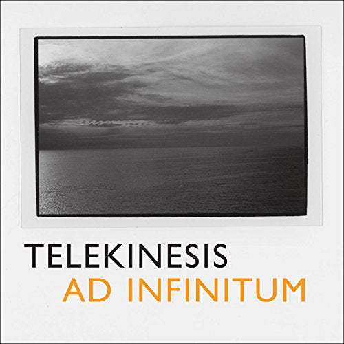 Black and white photo of a seascape with text Telekinesis Ad Infinitum below it.