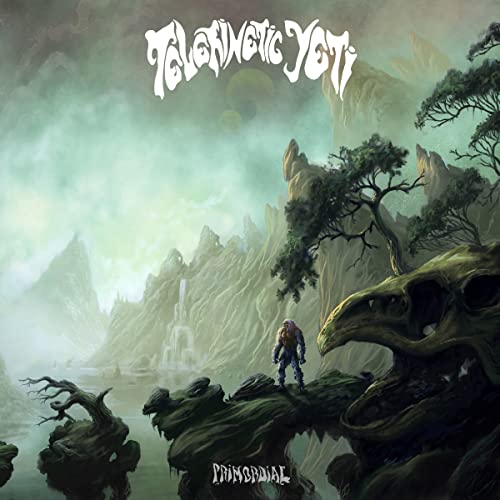 CD cover: misty mountains, a lone figure, and a large skull foreground.