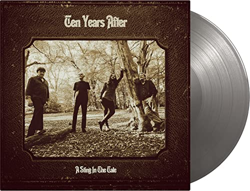 Ten Years After album cover with band photo and silver vinyl record.