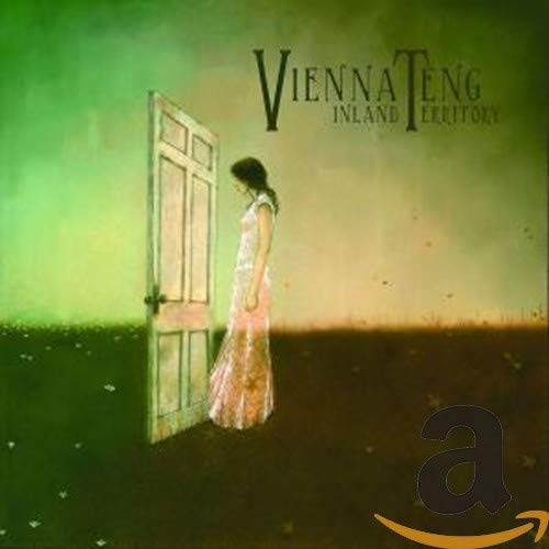 CD cover: woman looking at an open doorway in a green field.