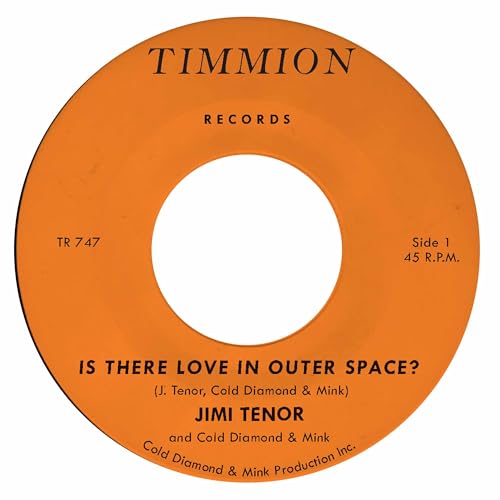 Orange vinyl record label with black text: "Is There Love In Outer Space?".