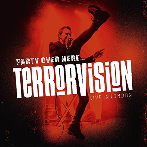 "Terrorvision live album cover with a man singing into a microphone on stage."