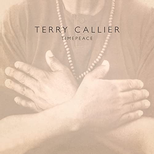 Album cover showing Terry Callier with arms crossed, wearing a beaded necklace, sepia toned.