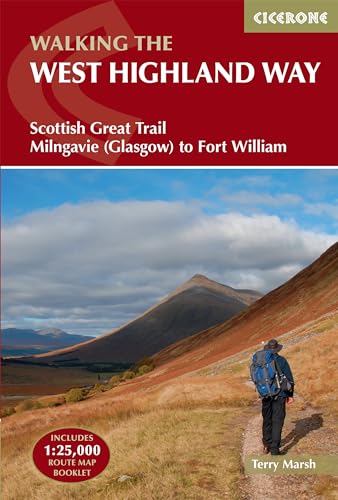 Guidebook cover showing a hiker on a trail with mountains in the background.