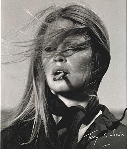 Black and white portrait of Kate Moss smoking, signed by Terry O’Neill.