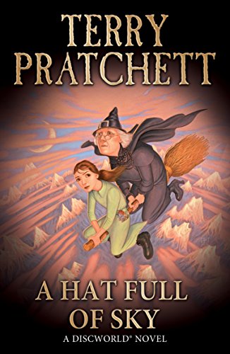 Book cover featuring a witch and girl flying on a broomstick over mountains.