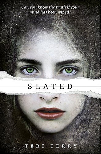 Book cover showing a girl's face with green eyes behind a torn paper effect.