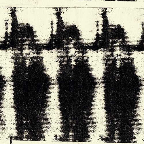 Black and white abstract image of distorted figures, possibly ghosts.
