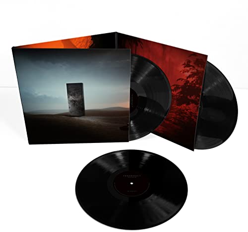 Double vinyl record with gatefold cover featuring a monolith landscape.