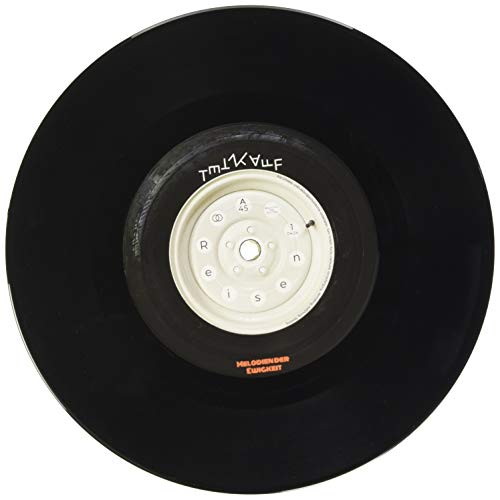 Black vinyl record with a white and grey center label.
