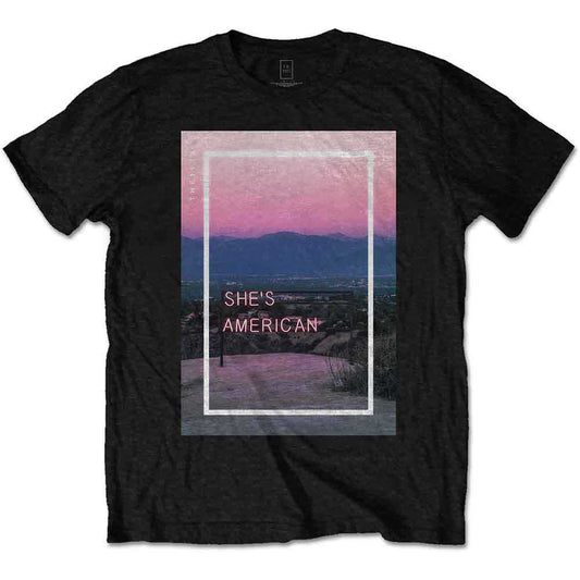 Black t-shirt with a landscape graphic and the text "SHE'S AMERICAN".