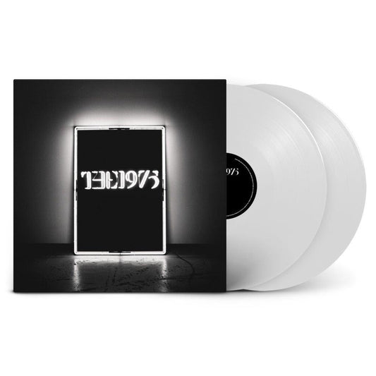 The 1975 album cover with two white vinyl records standing beside it.