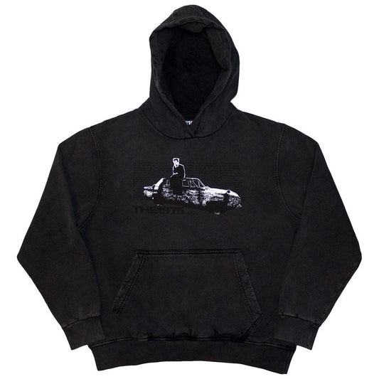 Black unisex pullover hoodie featuring a photographic print of a car on the front.