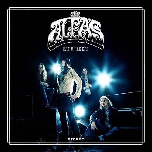 Vinyl record cover featuring a band, "The Alfas", with four members on stage.