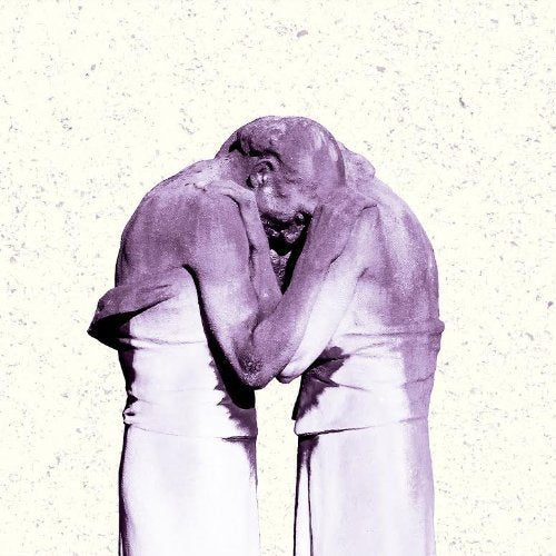 Two figures embracing, heads bowed, in muted purple tones.