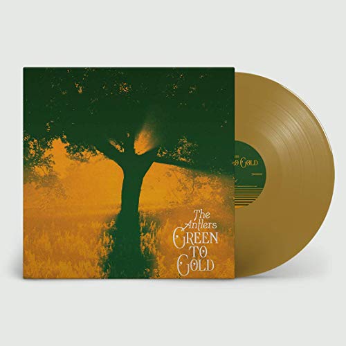 Gold vinyl record with album cover featuring a silhouetted tree.