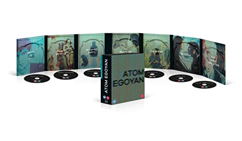 Bluray box set with discs and individual movie cases arranged in a semicircle.