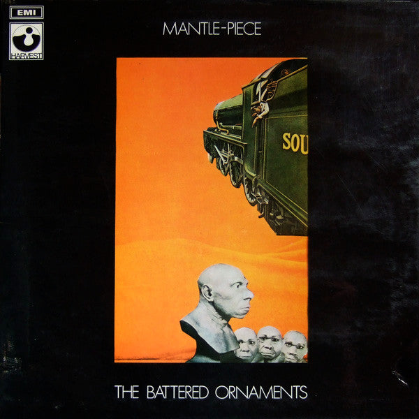 Vinyl album cover: train, heads, and orange-yellow abstract background.