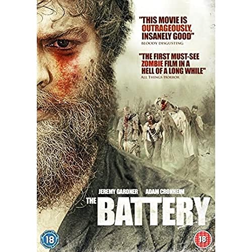 DVD cover art for The Battery featuring a bearded man and several zombies.