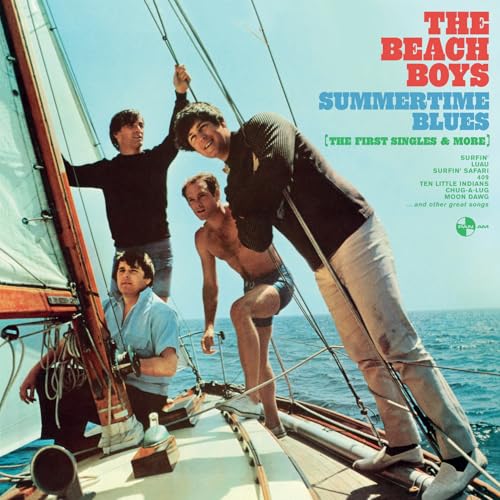 The Beach Boys on a sailboat with ropes and ocean in the background.