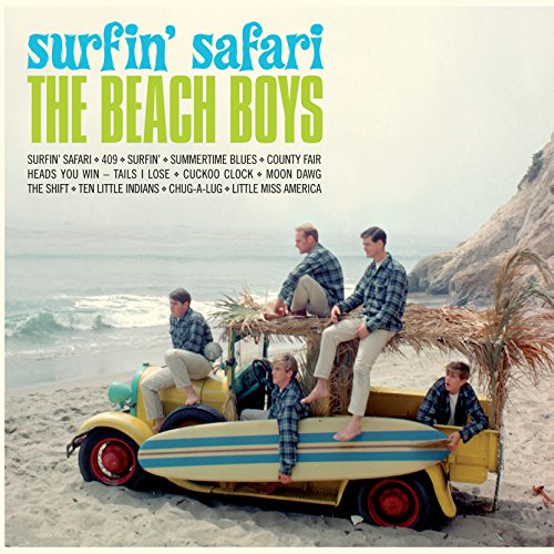"Album cover of 'Surfin' Safari' by The Beach Boys, featuring men on a beach."