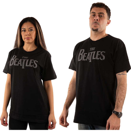 A man and a woman wearing black t-shirts with a silver diamante Beatles logo.